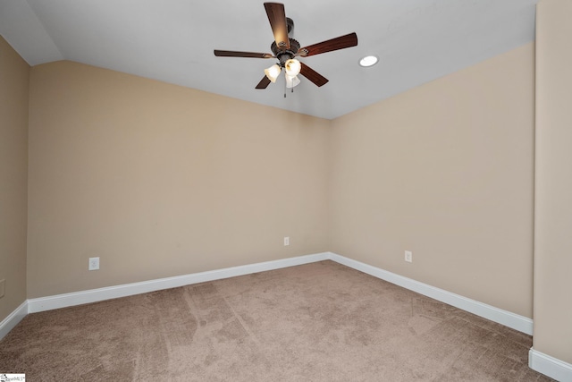 carpeted empty room featuring ceiling fan, recessed lighting, baseboards, and lofted ceiling