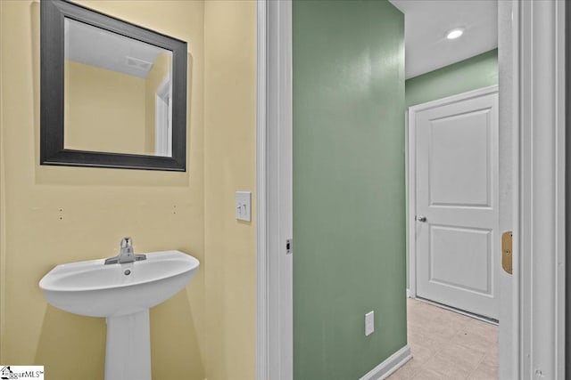 bathroom featuring baseboards