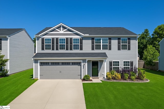 view of front facade featuring a garage, a front yard, and concrete driveway