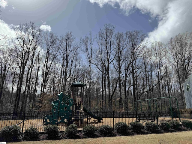 community jungle gym with fence