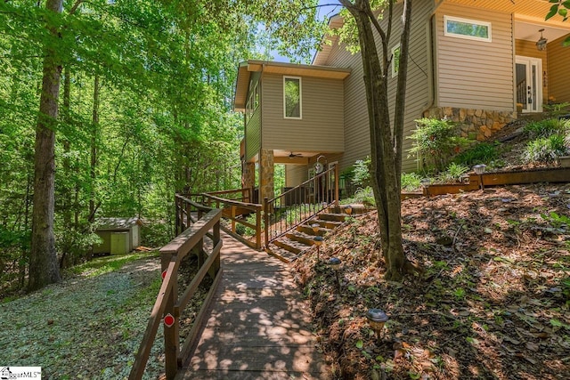 290 Coves End Pt, Seneca, SC 29678 - view of yard with a shed, an outbuilding, and stairs