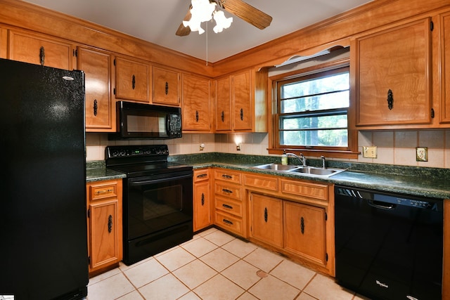 200 Lavonne Ave, Easley, SC 29642 - kitchen featuring black appliances, a sink, dark countertops, light tile patterned floors, and brown cabinetry