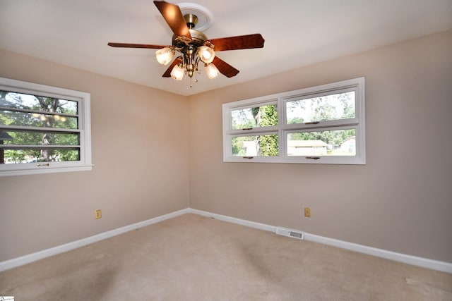 200 Lavonne Ave, Easley, SC 29642 - empty room featuring healthy amount of natural light, baseboards, light carpet, and a ceiling fan