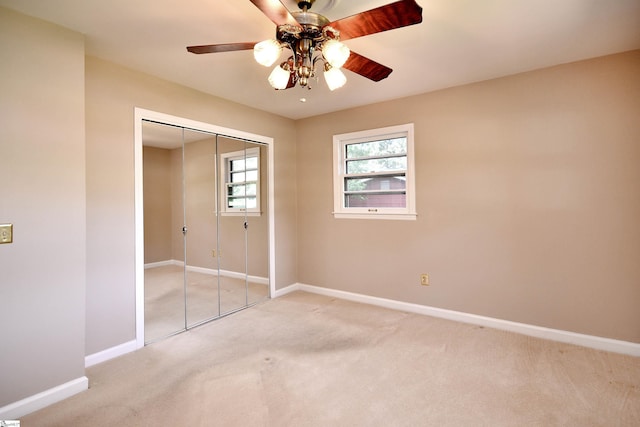 200 Lavonne Ave, Easley, SC 29642 - unfurnished bedroom with light colored carpet, baseboards, a closet, and ceiling fan