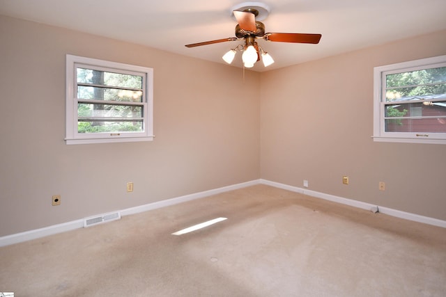 200 Lavonne Ave, Easley, SC 29642 - spare room featuring light colored carpet, baseboards, and ceiling fan
