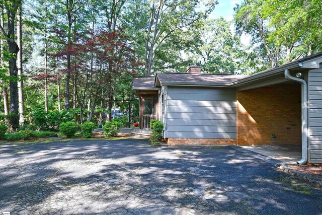 200 Lavonne Ave, Easley, SC 29642 - view of home's exterior with a chimney