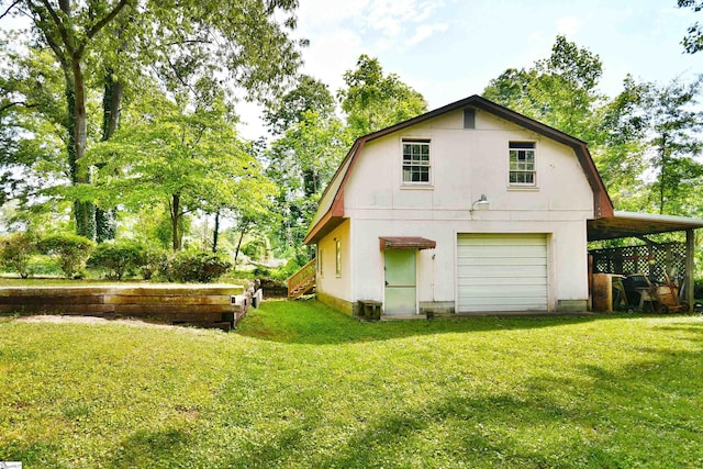 200 Lavonne Ave, Easley, SC 29642 - back of property featuring a lawn, a garage, and a gambrel roof