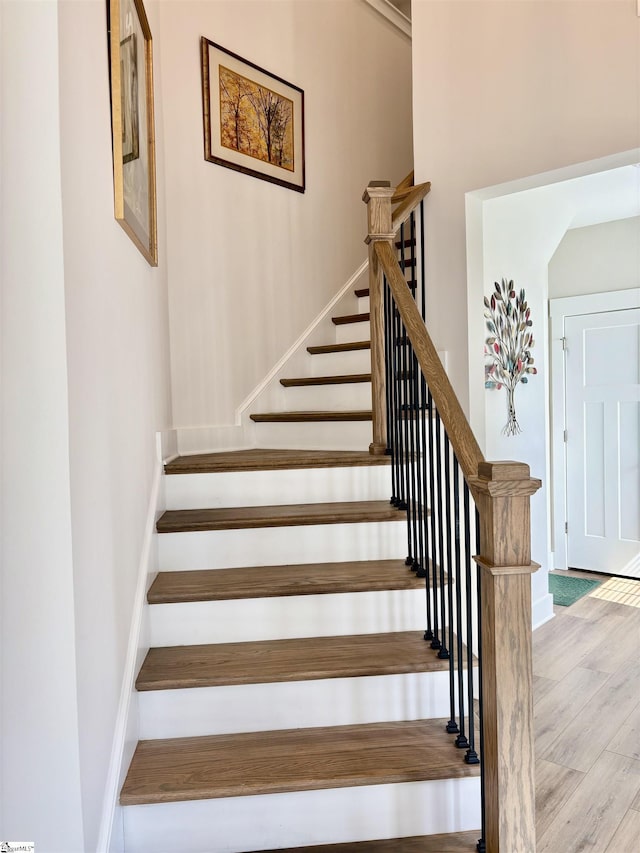 1560 Shallons Ct, Spartanburg, SC 29301 - stairway with wood finished floors and baseboards