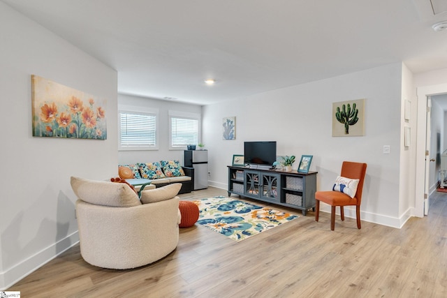 1560 Shallons Ct, Spartanburg, SC 29301 - living area with baseboards, wood finished floors, and attic access