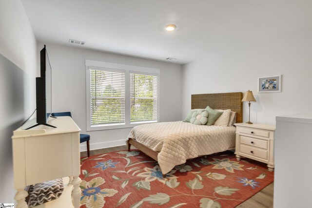 1560 Shallons Ct, Spartanburg, SC 29301 - bedroom featuring dark wood finished floors and baseboards