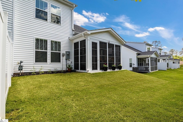 1560 Shallons Ct, Spartanburg, SC 29301 - rear view of house with a sunroom, a yard, and cooling unit
