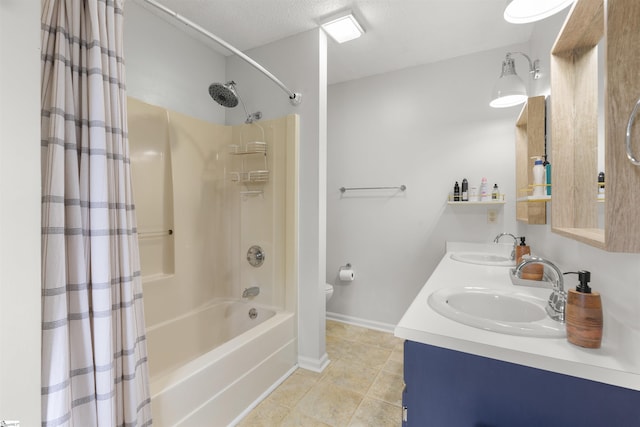 bathroom featuring shower / tub combo with curtain, tile patterned flooring, toilet, double vanity, and baseboards