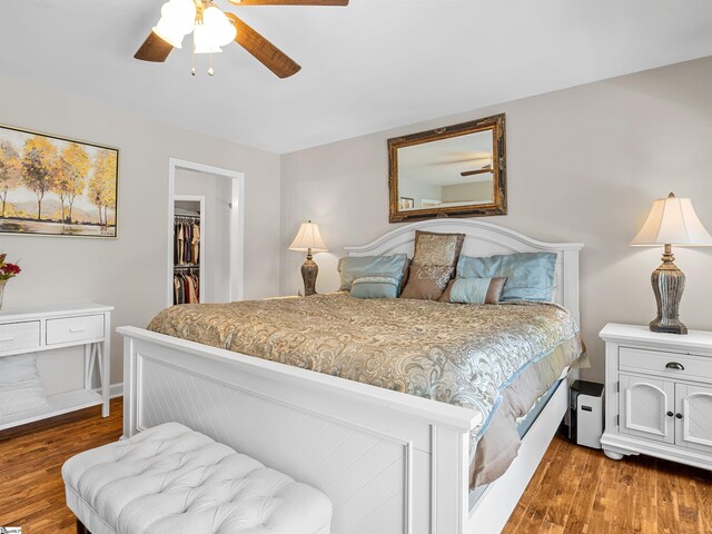 702 Lakewinds Blvd, Inman, SC 29349 - bedroom with wood finished floors, a spacious closet, a closet, and ceiling fan