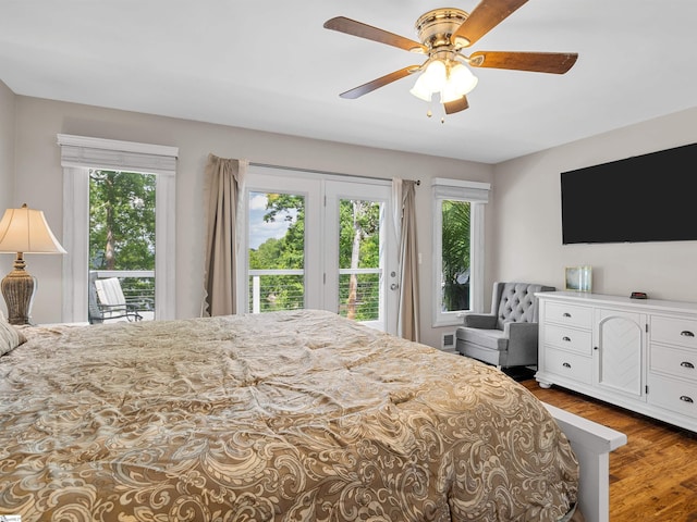 702 Lakewinds Blvd, Inman, SC 29349 - bedroom featuring access to outside, wood finished floors, and a ceiling fan