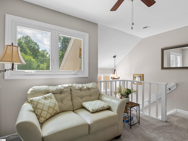 702 Lakewinds Blvd, Inman, SC 29349 - carpeted living room with healthy amount of natural light, a ceiling fan, lofted ceiling, baseboards, and a chandelier