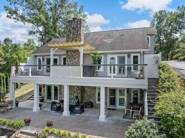 702 Lakewinds Blvd, Inman, SC 29349 - back of property with outdoor lounge area, a balcony, a patio area, and roof with shingles