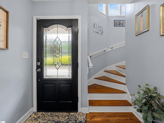 702 Lakewinds Blvd, Inman, SC 29349 - entrance foyer with stairs, wood finished floors, and baseboards