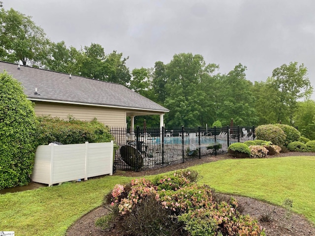 view of yard with a community pool