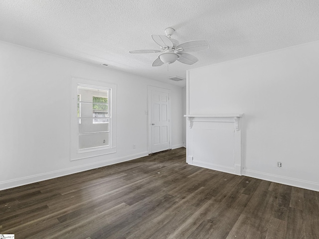 7 Williams St, Spartanburg, SC 29301 - empty room with dark wood-style floors, a textured ceiling, baseboards, and ceiling fan