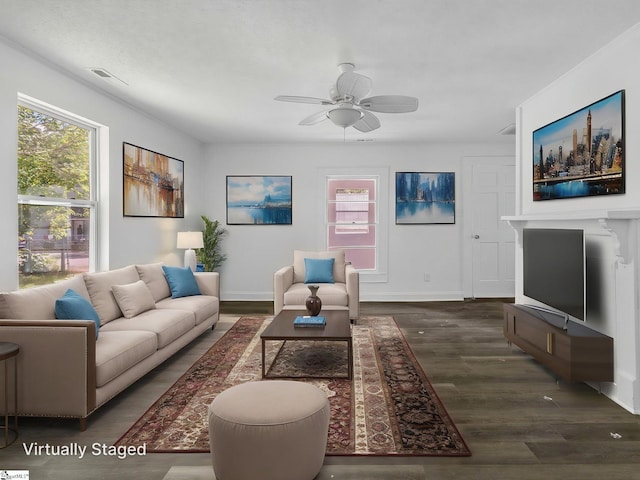 7 Williams St, Spartanburg, SC 29301 - living room with ceiling fan, healthy amount of natural light, wood finished floors, and baseboards