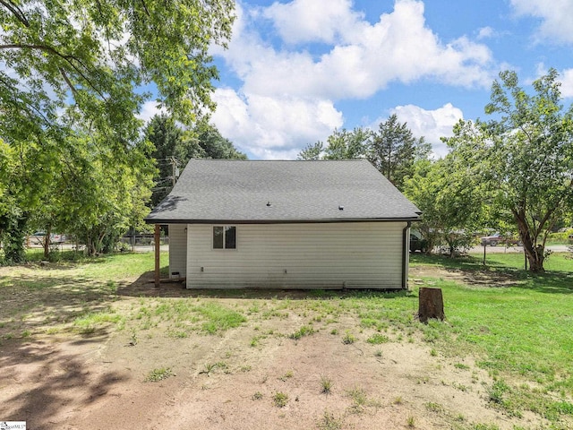 7 Williams St, Spartanburg, SC 29301 - back of property with a yard and roof with shingles