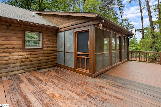 deck with a sunroom