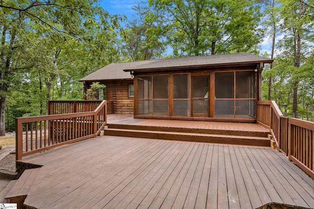 deck featuring a sunroom