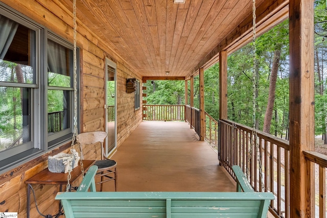wooden terrace with covered porch