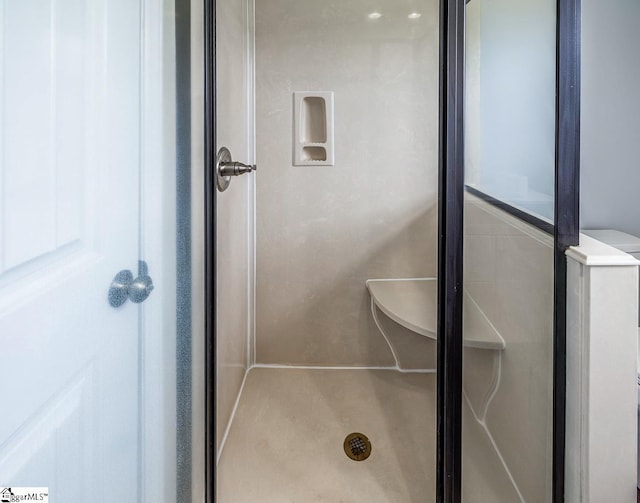 bathroom featuring a stall shower