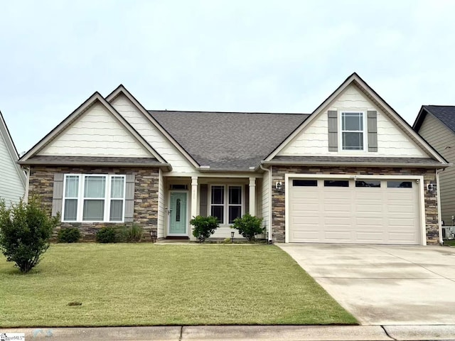 920 Hunterdale Ln, Boiling Springs, SC 29316 - craftsman inspired home with concrete driveway, stone siding, a front yard, and roof with shingles