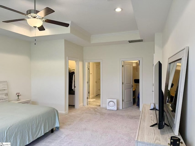 920 Hunterdale Ln, Boiling Springs, SC 29316 - bedroom featuring a raised ceiling, a spacious closet, crown molding, light colored carpet, and a closet