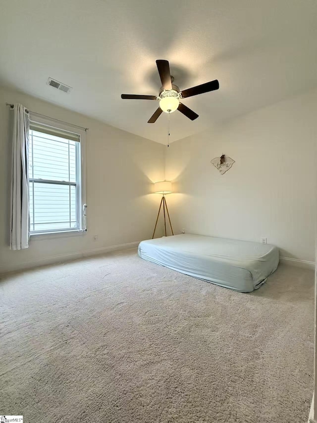 920 Hunterdale Ln, Boiling Springs, SC 29316 - unfurnished bedroom with carpet, baseboards, and ceiling fan