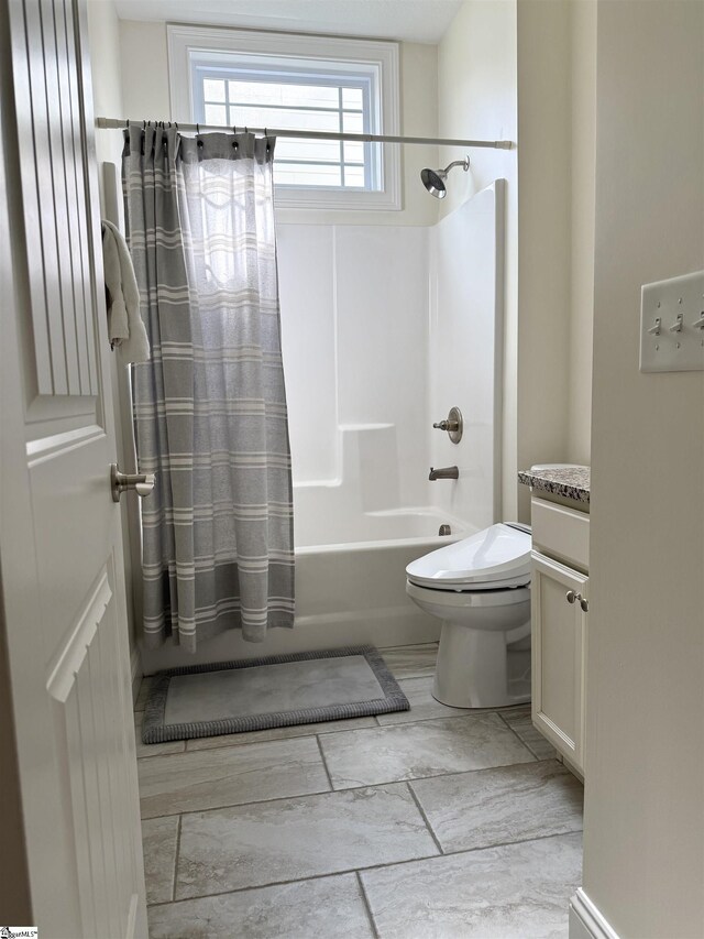 920 Hunterdale Ln, Boiling Springs, SC 29316 - bathroom featuring toilet, shower / tub combo, and marble look tiles