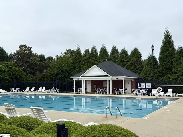 920 Hunterdale Ln, Boiling Springs, SC 29316 - community pool with fence, a patio, and a wooded view