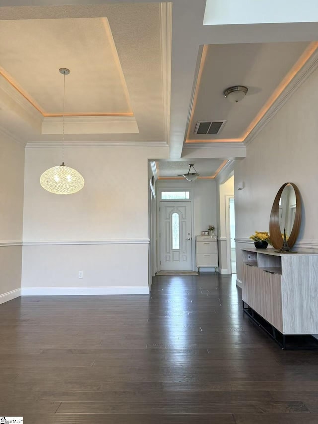 920 Hunterdale Ln, Boiling Springs, SC 29316 - living area with a raised ceiling, ornamental molding, dark wood-type flooring, and baseboards