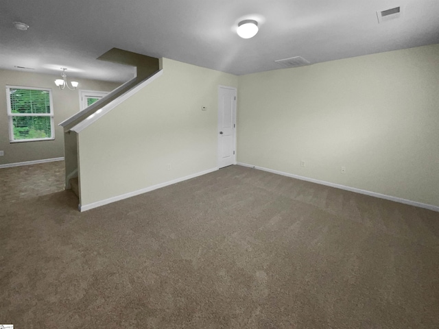 135 Evvalane Dr, Spartanburg, SC 29302 - below grade area with a chandelier, stairs, carpet floors, and baseboards
