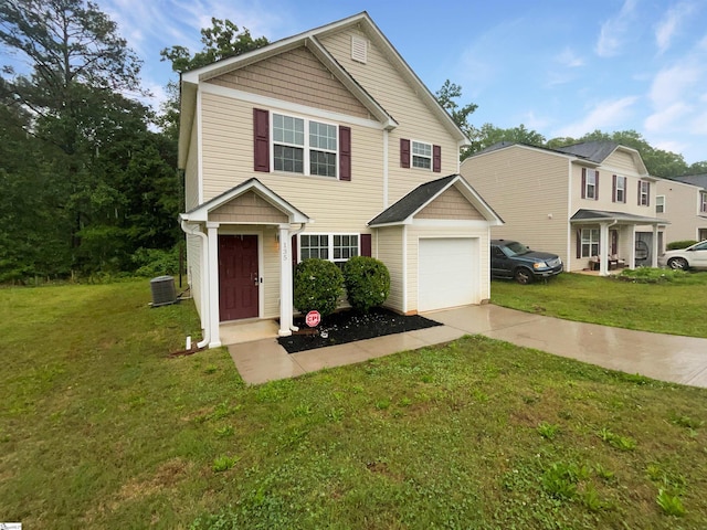 135 Evvalane Dr, Spartanburg, SC 29302 - traditional-style home with concrete driveway, central air condition unit, a front lawn, and a garage