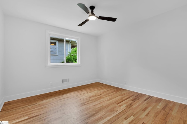 3902 Old Buncombe Rd, Greenville, SC 29617 - spare room with light wood finished floors, baseboards, and a ceiling fan