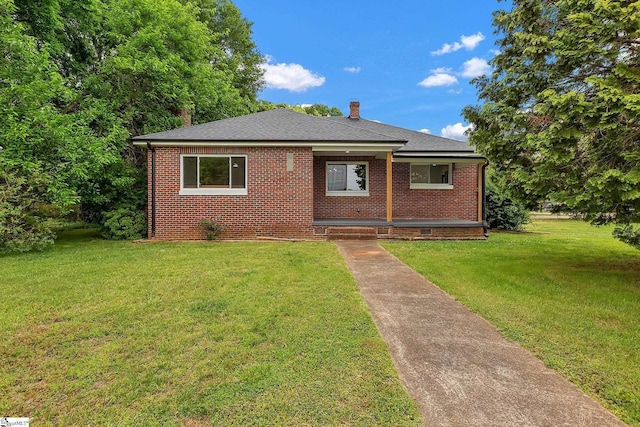 3902 Old Buncombe Rd, Greenville, SC 29617 - bungalow featuring brick siding, a front lawn, and roof with shingles