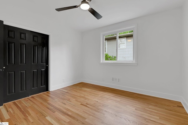 3902 Old Buncombe Rd, Greenville, SC 29617 - unfurnished bedroom featuring light wood finished floors, baseboards, and ceiling fan