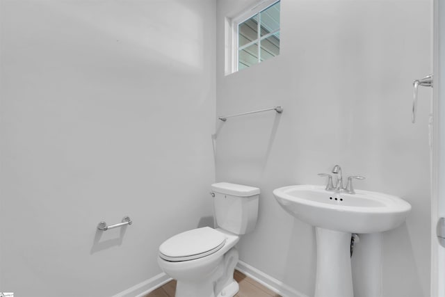 307 E Compass Way, Easley, SC 29640 - bathroom with baseboards, toilet, and a sink
