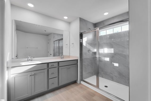 307 E Compass Way, Easley, SC 29640 - full bathroom featuring a stall shower, double vanity, wood finished floors, and recessed lighting
