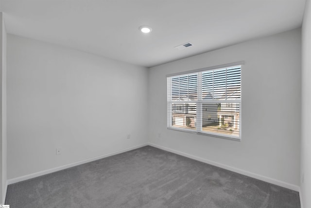 307 E Compass Way, Easley, SC 29640 - empty room featuring dark colored carpet, baseboards, and recessed lighting