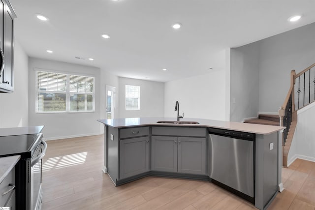 307 E Compass Way, Easley, SC 29640 - kitchen with a sink, appliances with stainless steel finishes, gray cabinetry, light countertops, and recessed lighting
