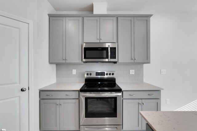 307 E Compass Way, Easley, SC 29640 - kitchen featuring appliances with stainless steel finishes and gray cabinetry