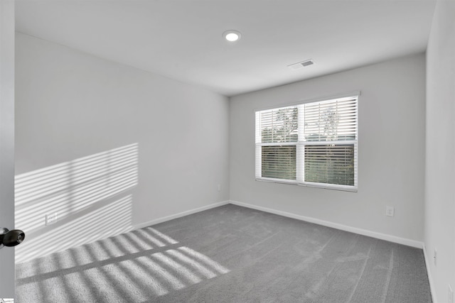 unfurnished room with baseboards, carpet flooring, and recessed lighting