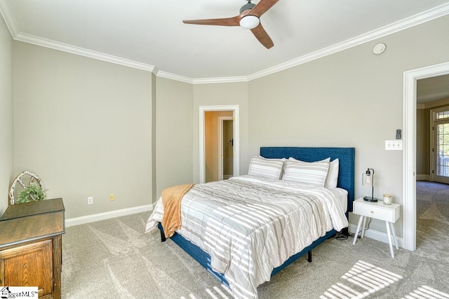 bedroom featuring carpet flooring, crown molding, baseboards, and ceiling fan