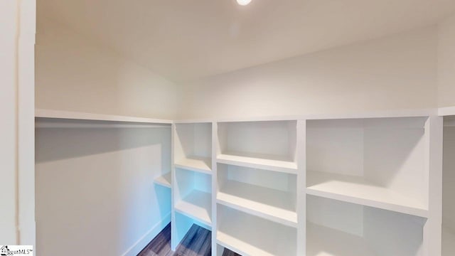 1306 Fairview Rd, Gaffney, SC 29341 - walk in closet with dark wood finished floors