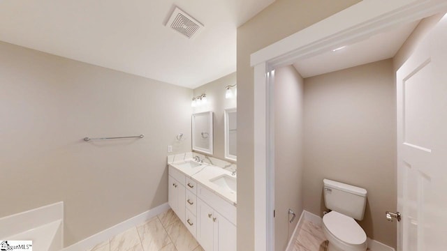 1306 Fairview Rd, Gaffney, SC 29341 - full bath with toilet, baseboards, marble finish floors, and double vanity