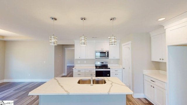 1306 Fairview Rd, Gaffney, SC 29341 - kitchen with stainless steel microwave, range with electric cooktop, a sink, baseboards, and recessed lighting